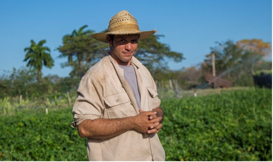 Alfredo in his field where he plants corn, beans and vegetables. Photo: WFP/Ismael Francisco